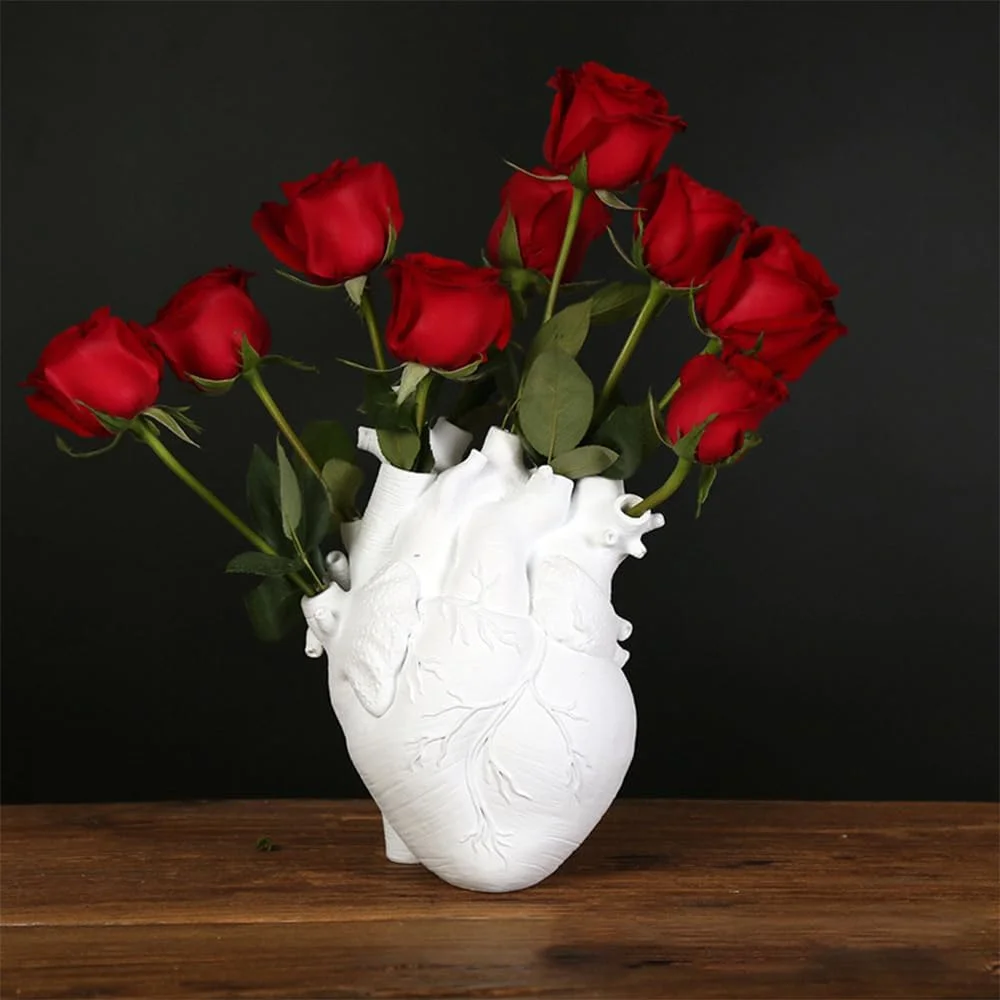 White ceramic vase shaped like an anatomical human heart