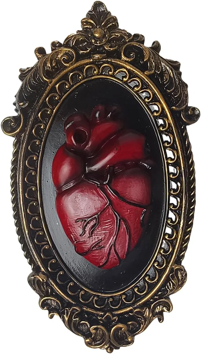 Red anatomical heart wall sculpture with antique gold oval frame
