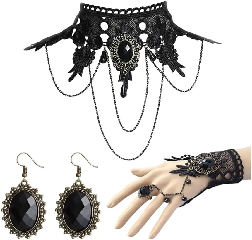 Gothic costume jewelry set displayed together including a black lace choker necklace, matching drop earrings, a bracelet, and a ring, styled for witch or vampire Halloween outfits