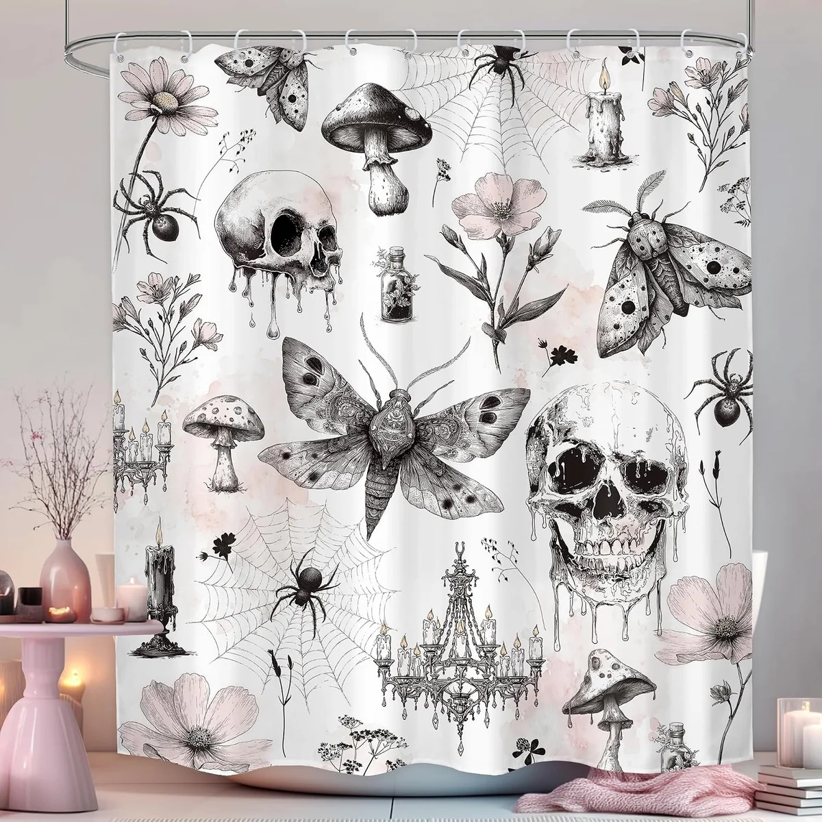 Fabric bathroom shower curtain, 60 by 71 inches, printed with a gothic collage of white human skulls, a pink death's-head moth, pink flowers, green leaves and a spider, sold with a set of 12 matching hooks