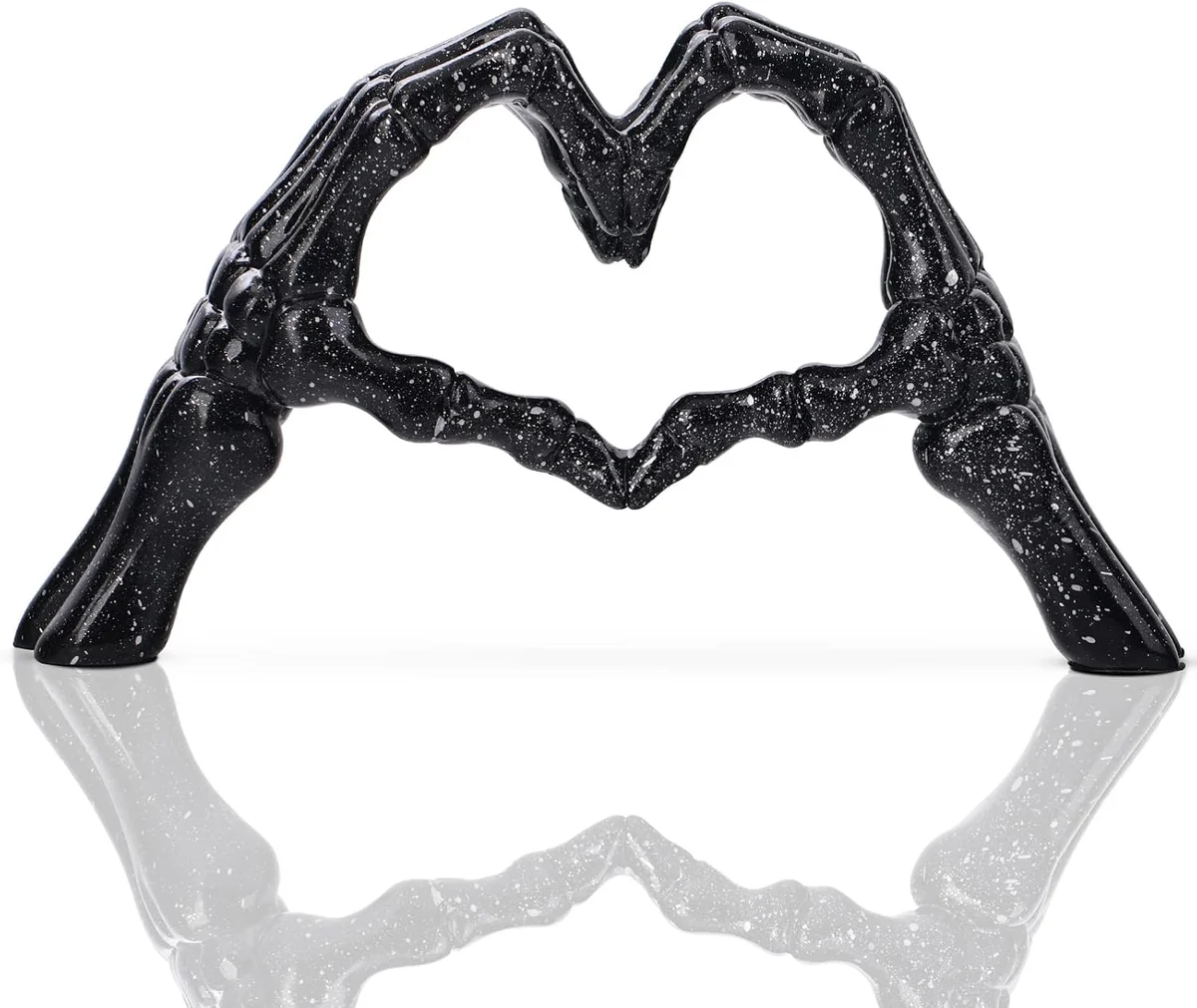 Small black gothic tabletop sculpture of two skeletal hands curled together at the fingertips to form the shape of a heart, cast in matte dark resin and sized as a shelf, desk, or coffee-table centerpiece ornament