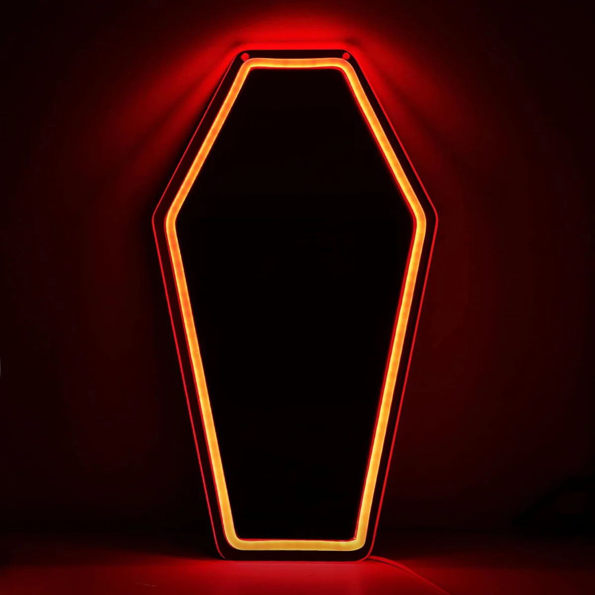 Neon coffin-shaped mirror with LED light edges and gothic styling