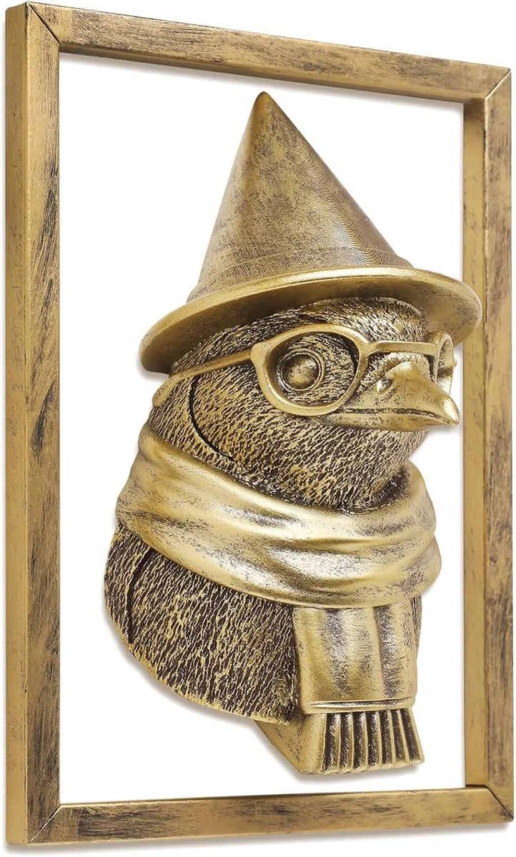 Resin penguin head wall sculpture with gold-tone metal mounting frame