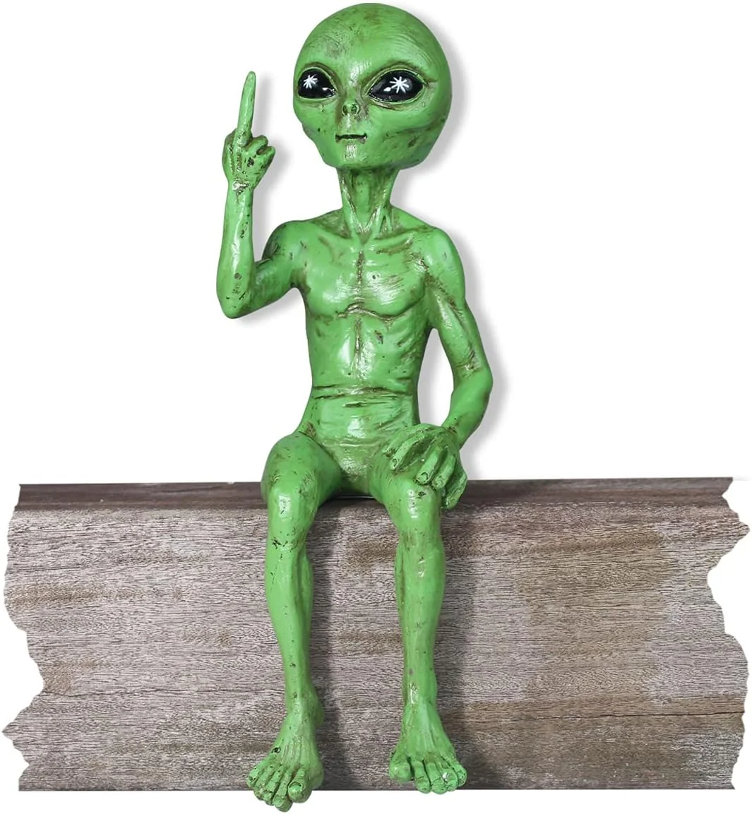 Rude alien shelf sitter figurine in cosmic green