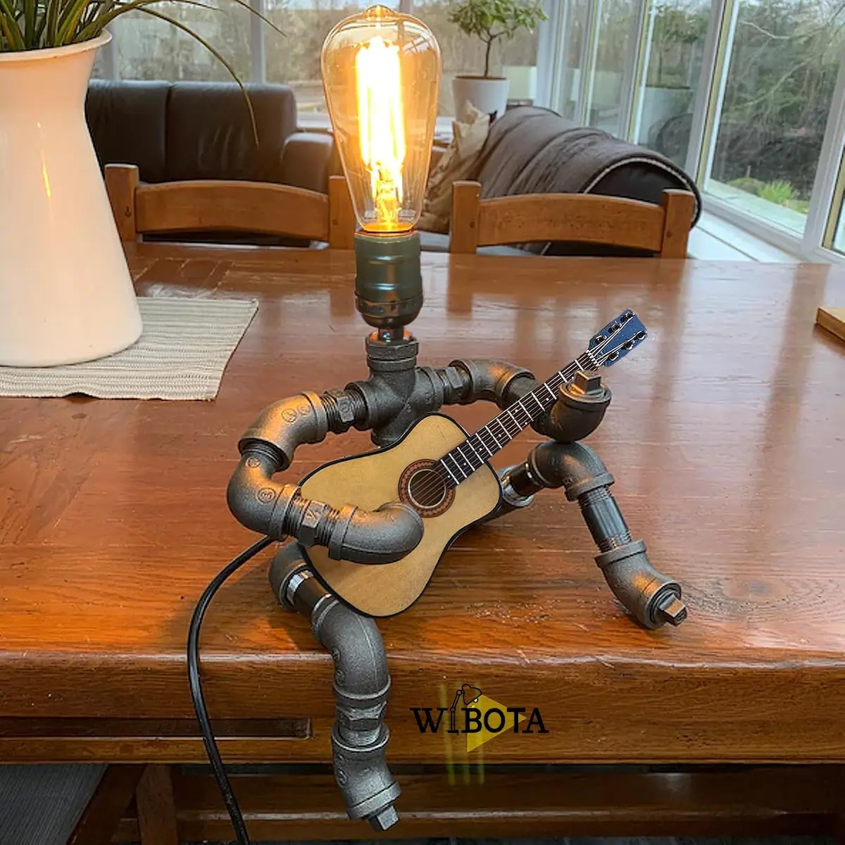 Steampunk-style desk lamp made from pipe fittings