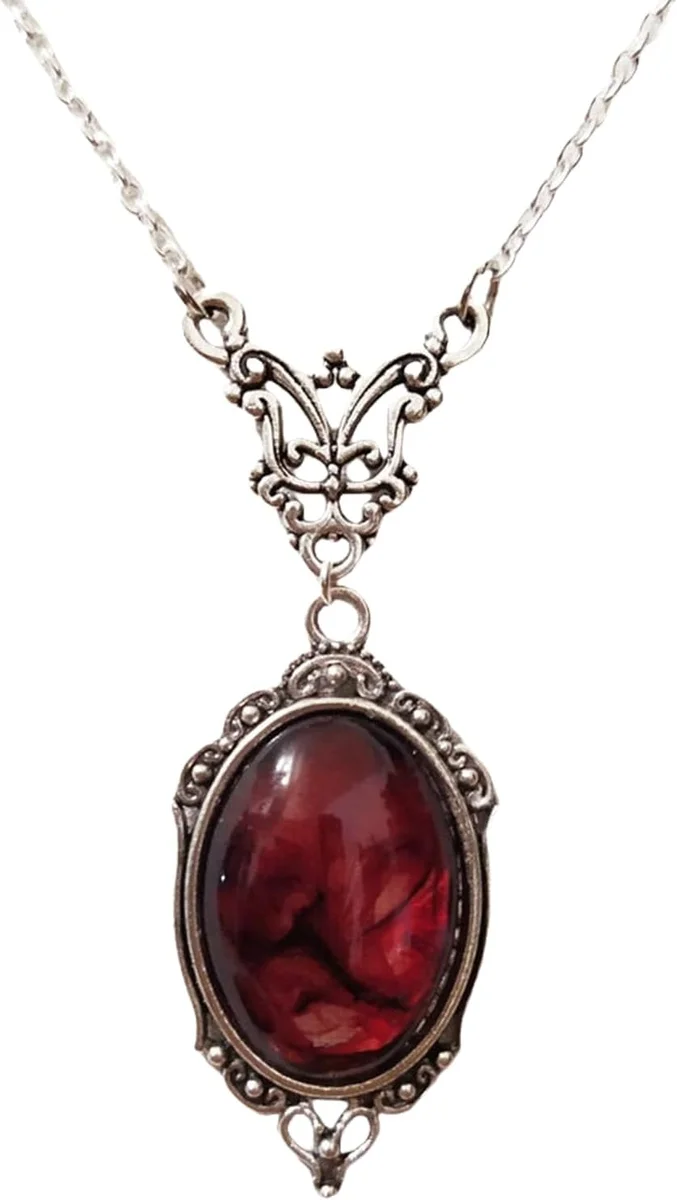 Vampire pendant necklace with vintage crystal cameo detail and gothic styling